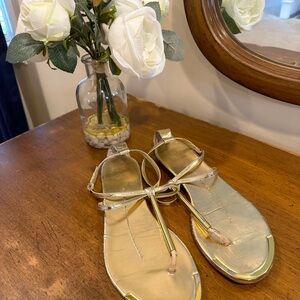 Gold sandals great looking slightly worn